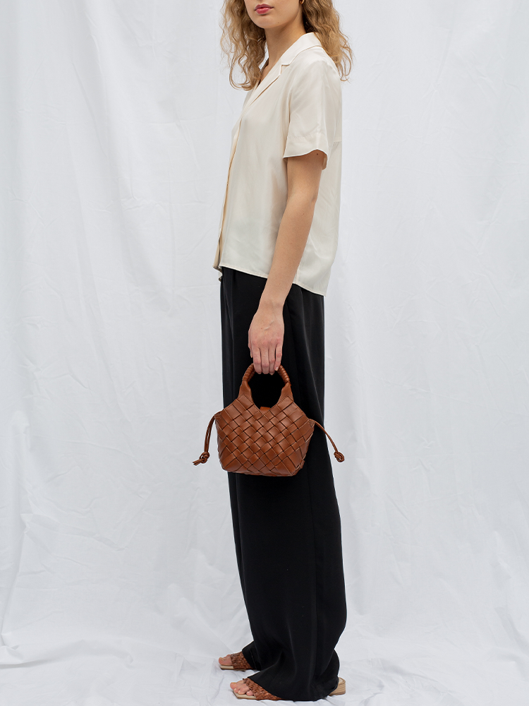 Cala Jade brown cross-body bag on model